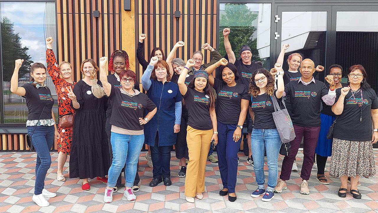 Group picture of JHL's Eastern Finland immigrant network. A group of happy people.